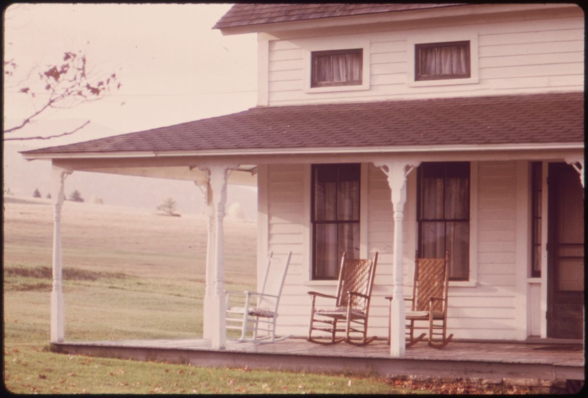 Rocking chairs on a farmhouse porch